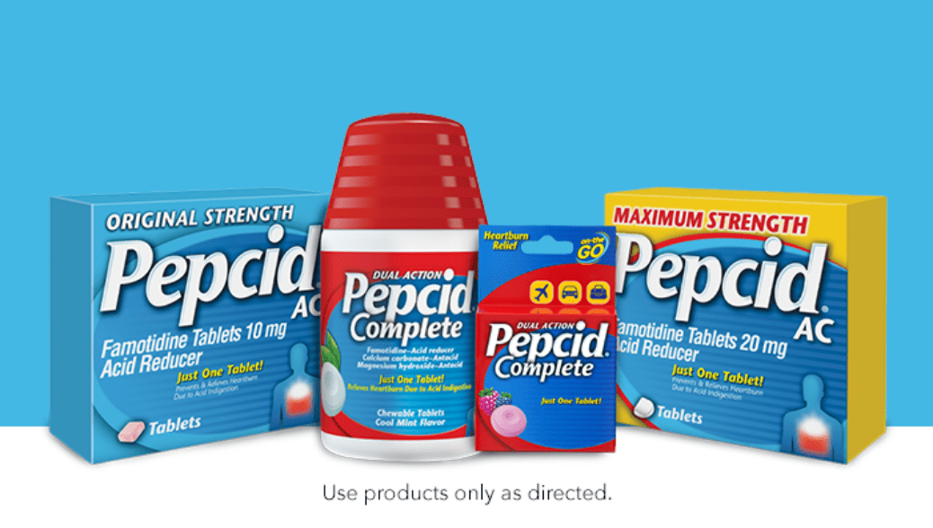 four pepcid product packages with blue background